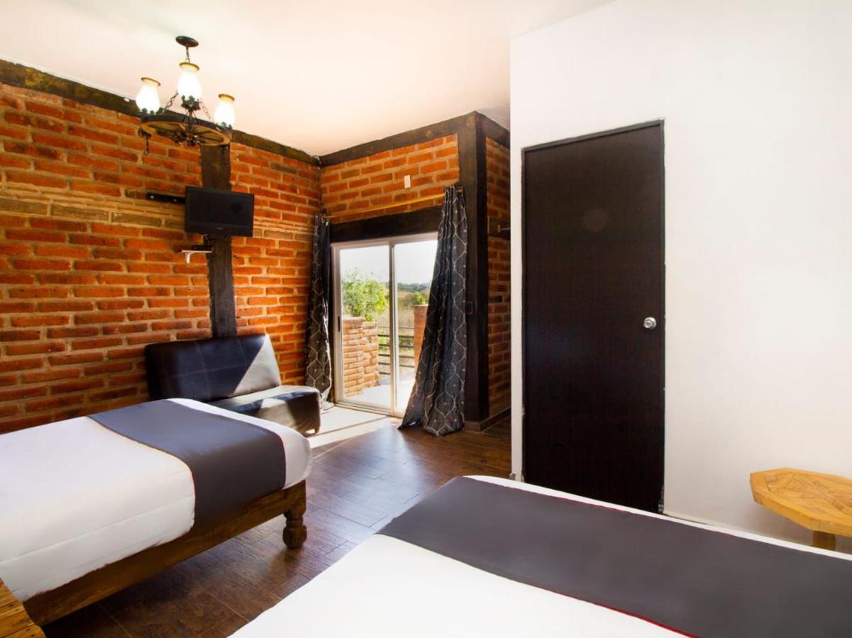 Hotel Cabanas Azul Tequilana Арандас Экстерьер фото